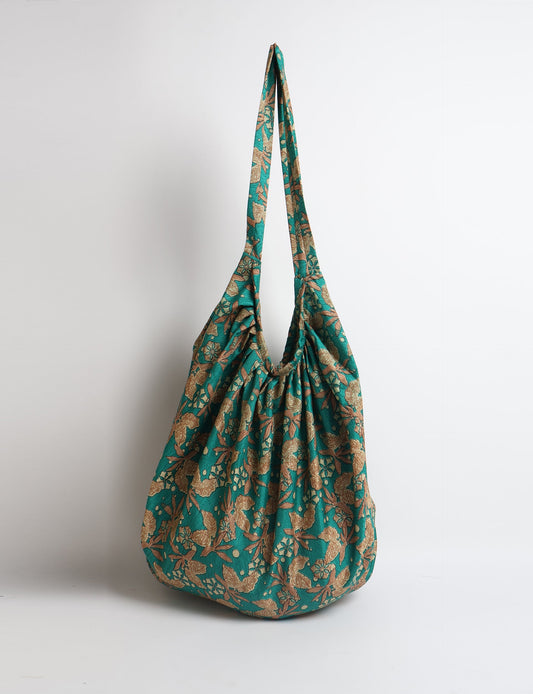 A stylish HOBO BAG made from recycled materials, perfect for eco-conscious fashionistas.