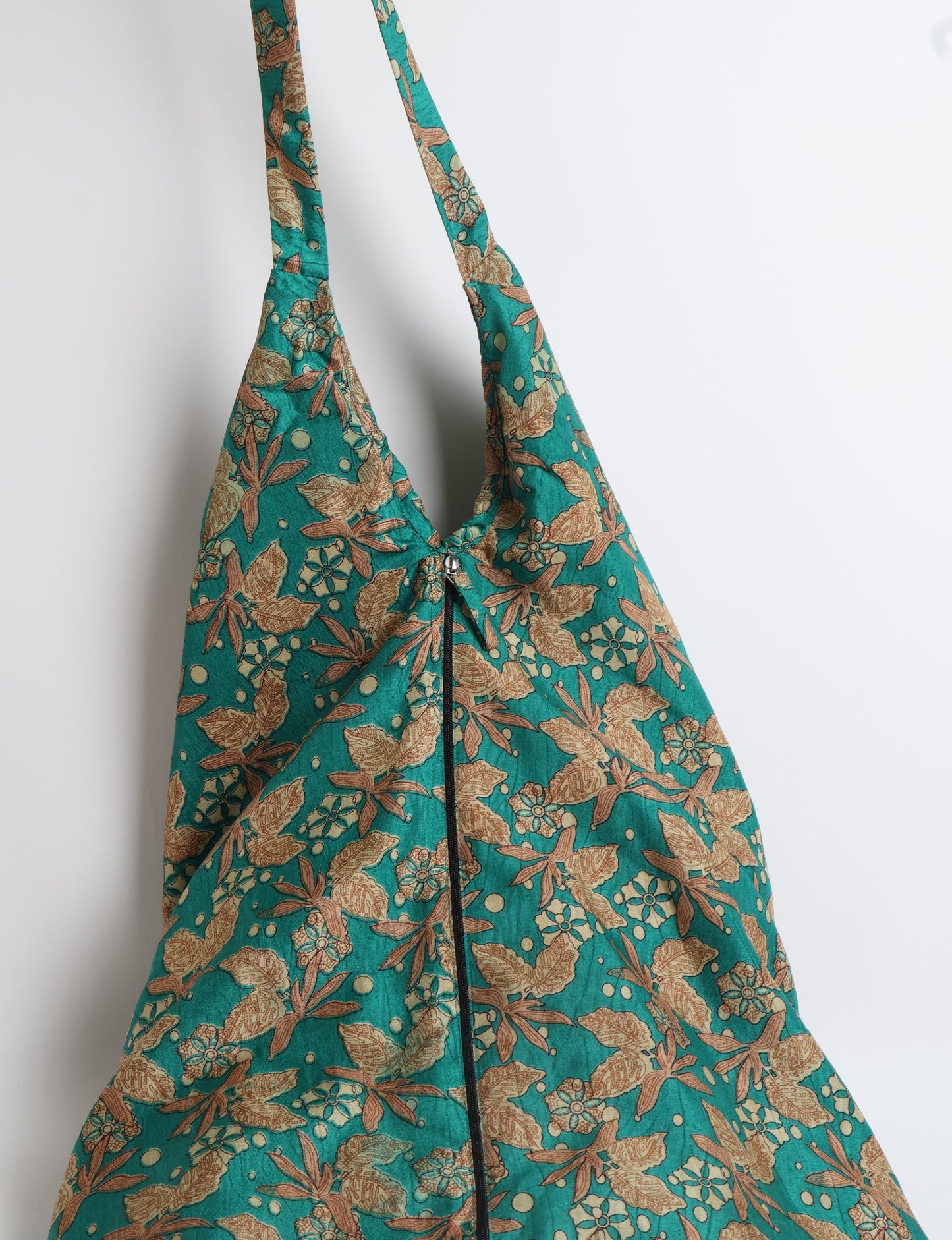 A stylish HOBO BAG made from recycled materials, perfect for eco-conscious fashionistas.