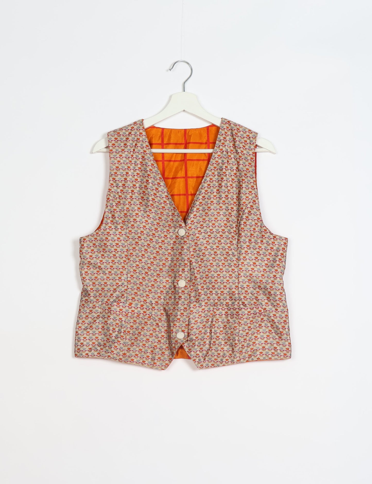 Day Waistcoat made from repurposed saris with macramé-covered buttons, showcasing eco clothing and recycled sari fashion for an eco-friendly, upcycled women's garment.