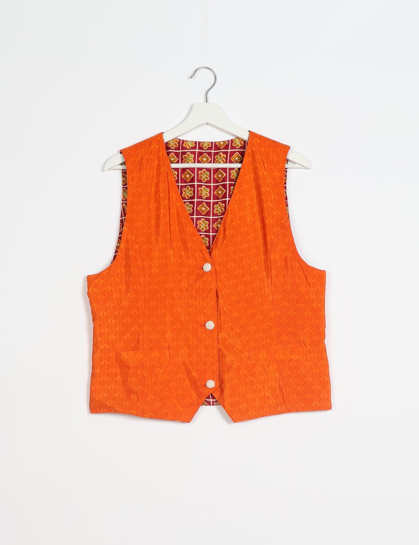 Day Waistcoat made from repurposed saris with macramé-covered buttons, showcasing eco clothing and recycled sari fashion for an eco-friendly, upcycled women's garment.