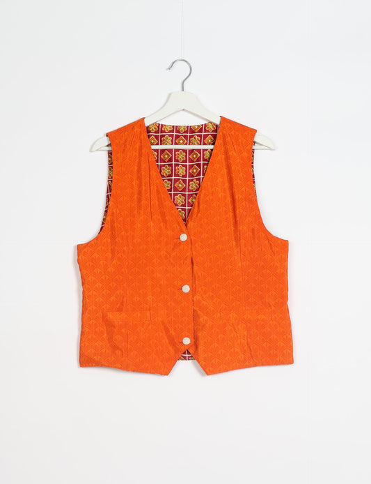 Day Waistcoat made from repurposed saris with macramé-covered buttons, showcasing eco clothing and recycled sari fashion for an eco-friendly, upcycled women's garment.