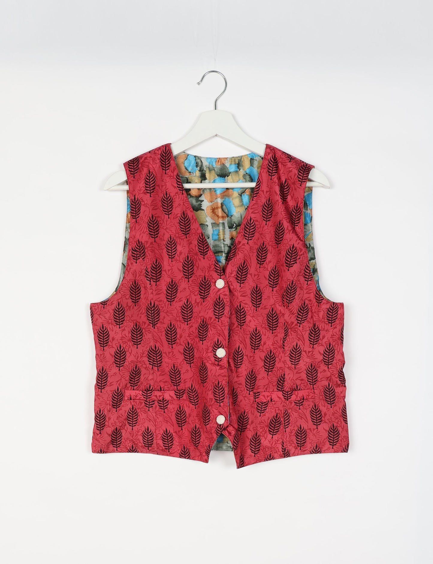 Day Waistcoat made from repurposed saris with macramé-covered buttons, showcasing eco clothing and recycled sari fashion for an eco-friendly, upcycled women's garment.