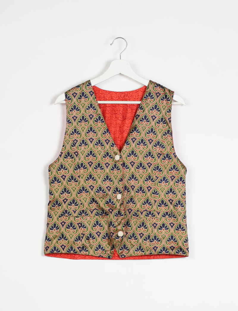 Beige Indian ethnic waistcoat with blue and green floral pattern, front buttons, and red inner lining, hanging on white hanger