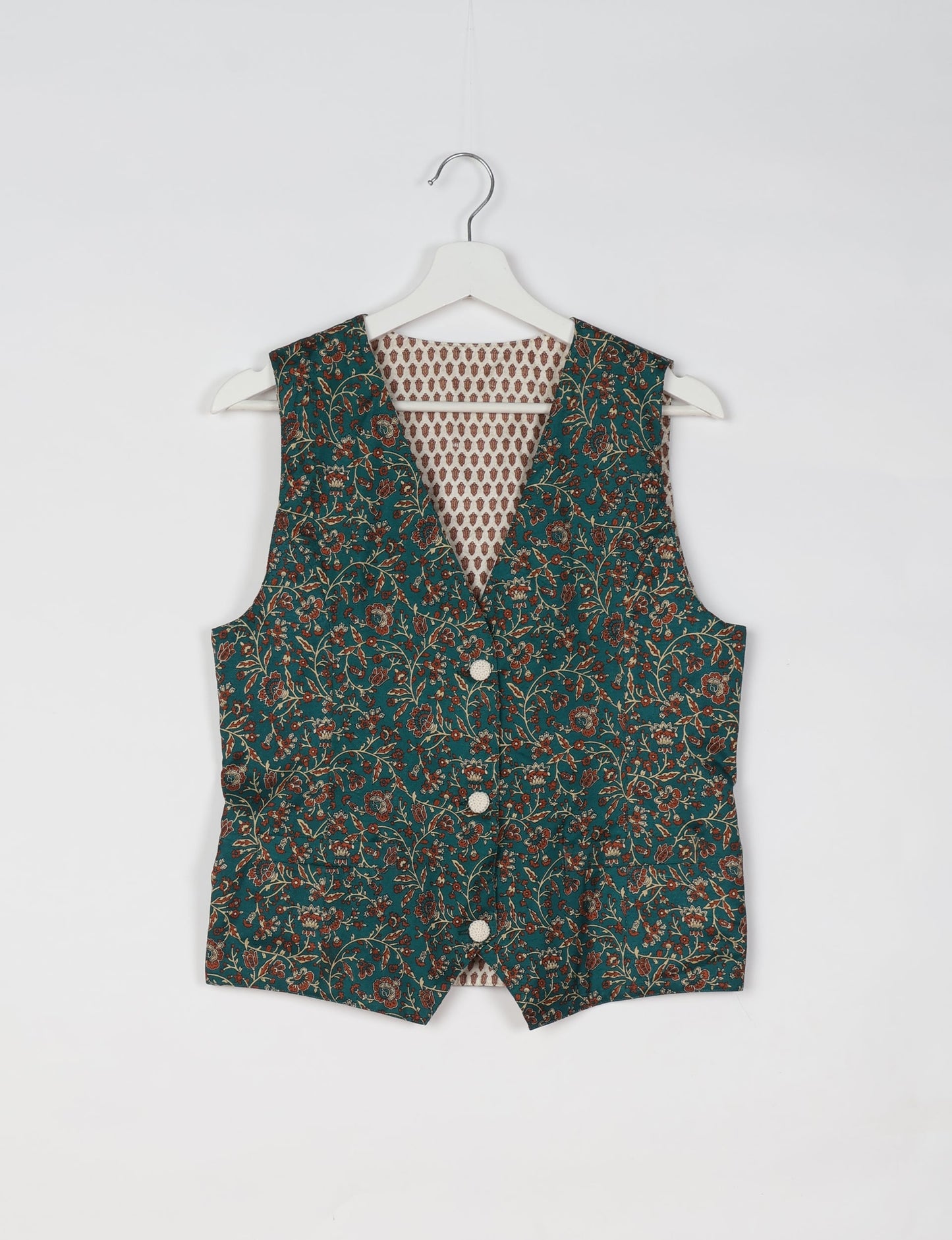 Day Waistcoat made from repurposed saris with macramé-covered buttons, showcasing eco clothing and recycled sari fashion for an eco-friendly, upcycled women's garment.