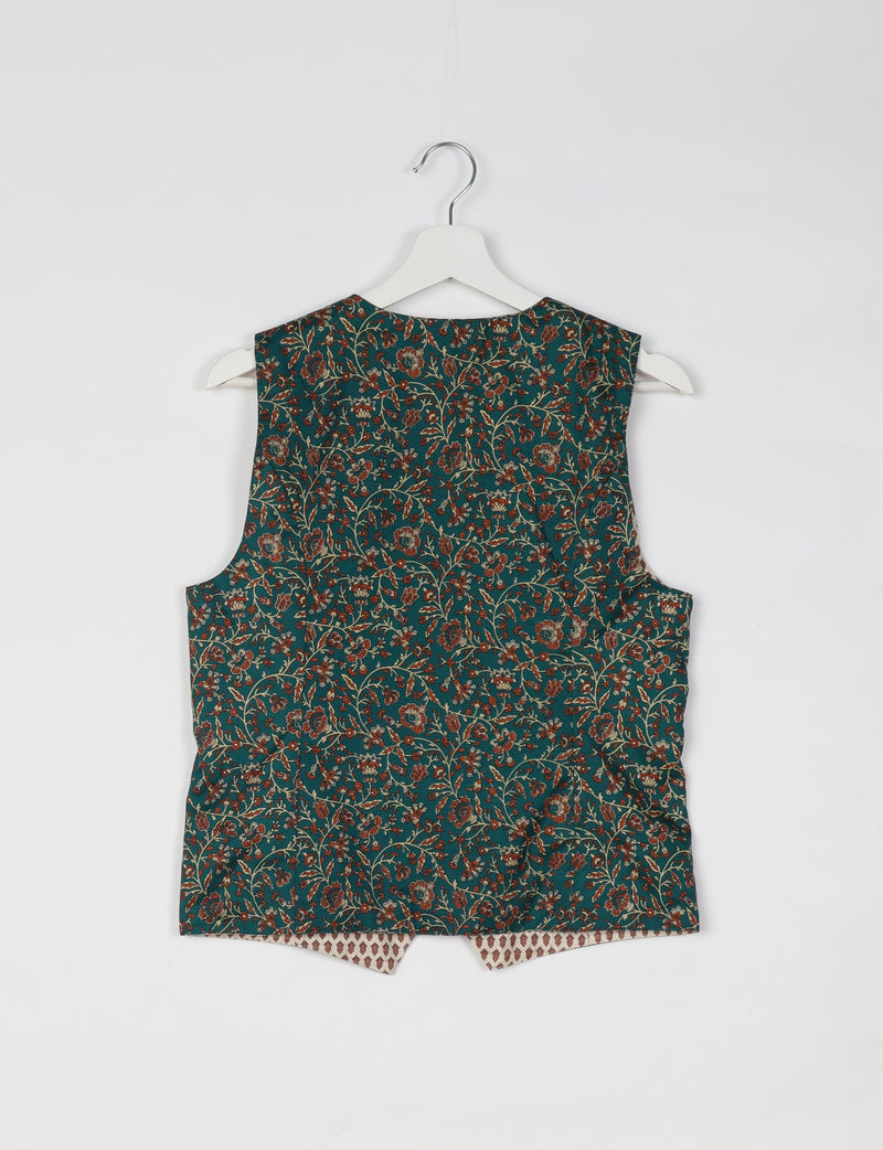 Green sleeveless waistcoat with red and beige floral micro design, shown from back on white hanger against white background