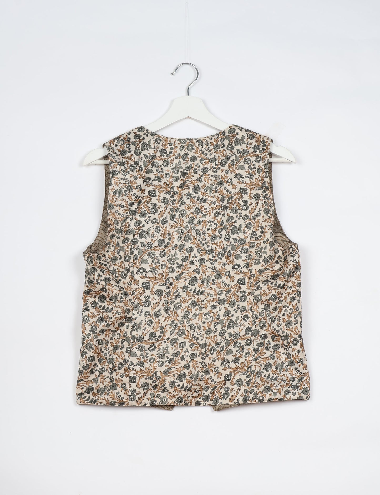 Day Waistcoat made from repurposed saris with macramé-covered buttons, showcasing eco clothing and recycled sari fashion for an eco-friendly, upcycled women's garment.