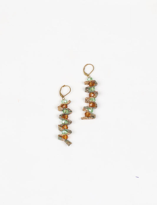 Wavy Dangler Earrings made from upcycled materials, showcasing eco-friendly fashion and sustainable women's clothing. A delicate blend of style and environmentally friendly design, perfect for those who value conscious clothing and circular fashion.