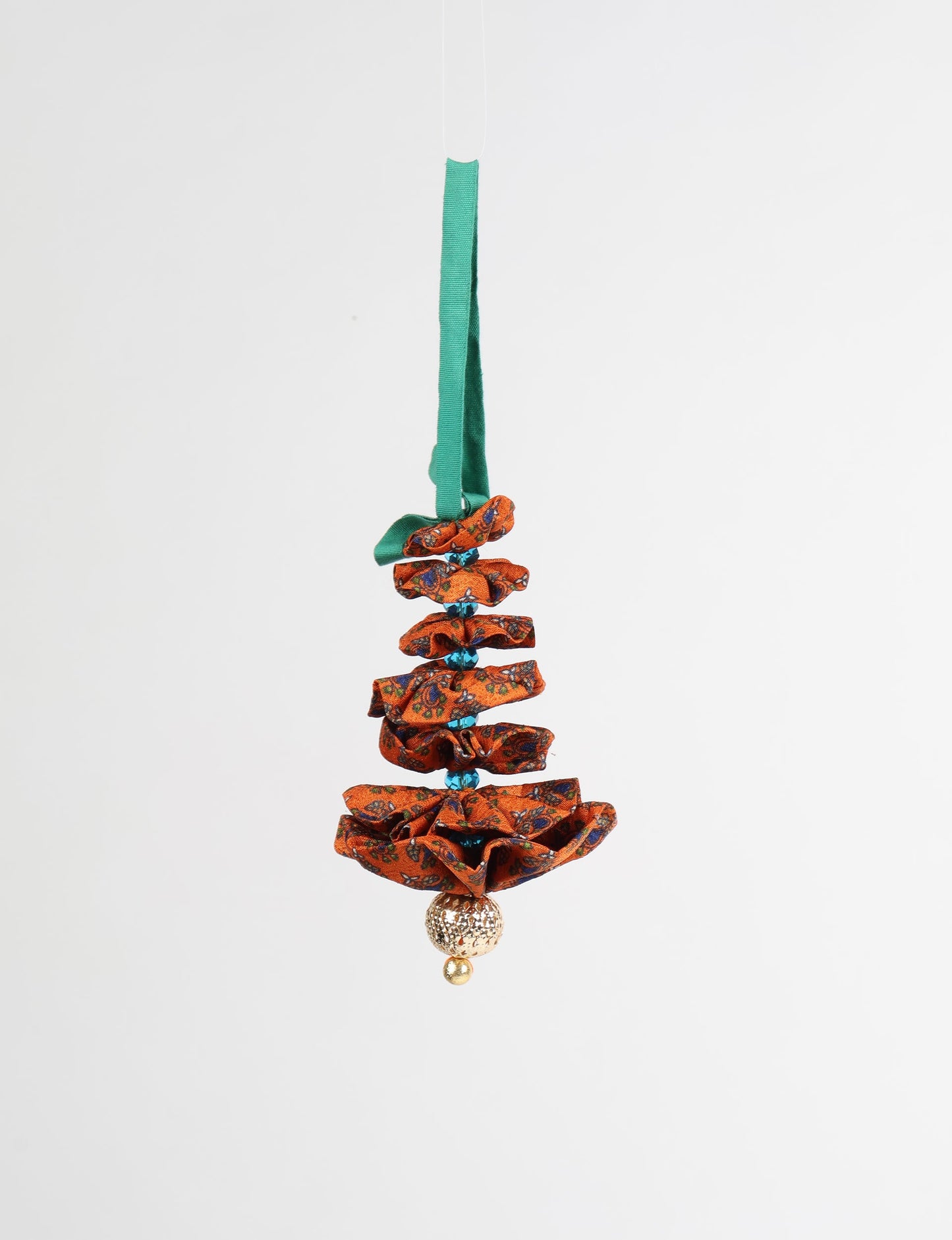 Tree Christmas Ornament crafted from upcycled materials, showcasing sustainable fashion and eco-friendly design, a delightful addition to holiday décor made from recycled and repurposed fabrics.