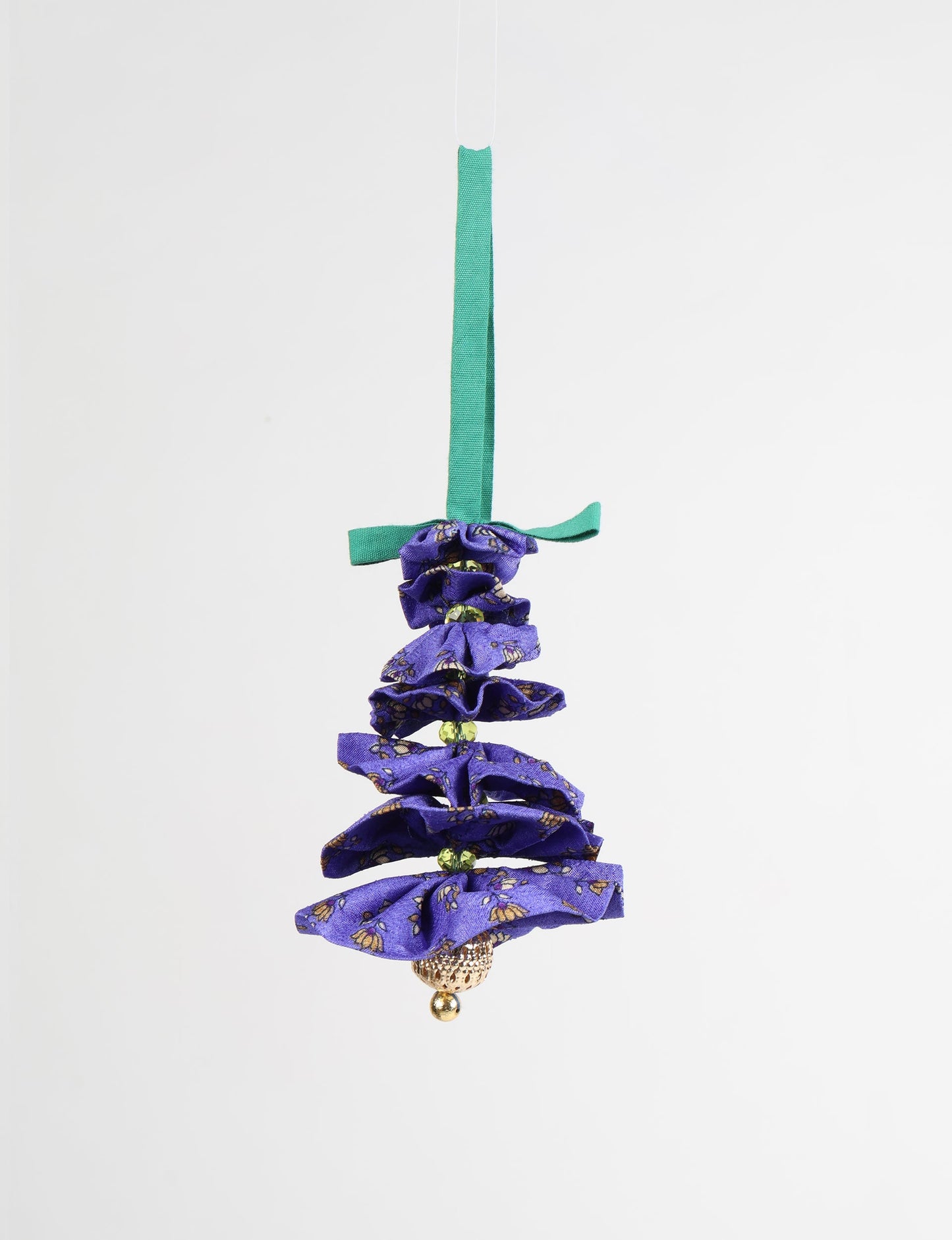 Tree Christmas Ornament crafted from upcycled materials, showcasing sustainable fashion and eco-friendly design, a delightful addition to holiday décor made from recycled and repurposed fabrics.