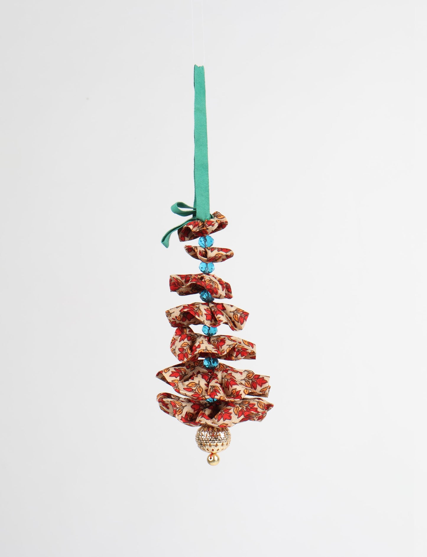 Tree Christmas Ornament crafted from upcycled materials, showcasing sustainable fashion and eco-friendly design, a delightful addition to holiday décor made from recycled and repurposed fabrics.