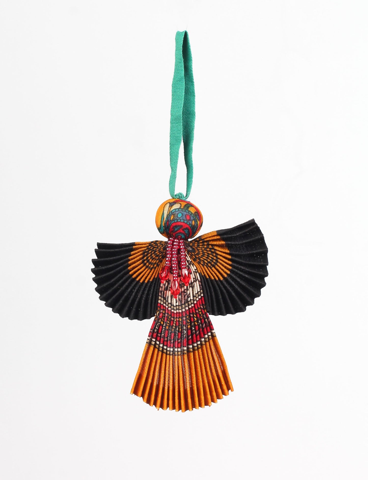 Angel Christmas Ornament made from upcycled saris, featuring pleated arms and body. A sustainable, eco-friendly holiday decoration, embodying recycled fashion and upcycling in festive style.





