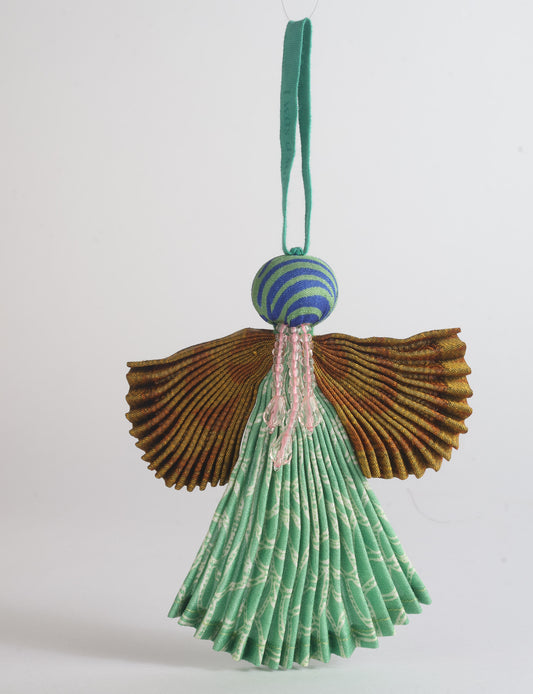 Angel Christmas Ornament made from upcycled saris, featuring pleated arms and body. A sustainable, eco-friendly holiday decoration, embodying recycled fashion and upcycling in festive style.





