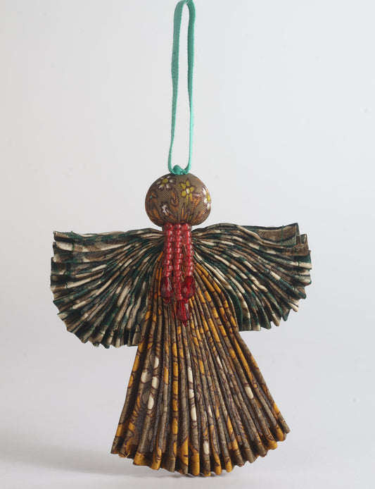 Angel Christmas Ornament made from upcycled saris, featuring pleated arms and body. A sustainable, eco-friendly holiday decoration, embodying recycled fashion and upcycling in festive style.





