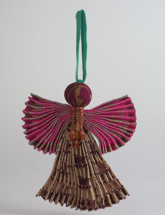 Angel Christmas Ornament made from upcycled saris, featuring pleated arms and body. A sustainable, eco-friendly holiday decoration, embodying recycled fashion and upcycling in festive style.






