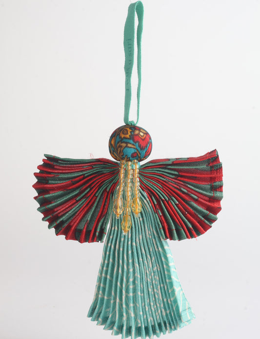 Angel Christmas Ornament made from upcycled saris, featuring pleated arms and body. A sustainable, eco-friendly holiday decoration, embodying recycled fashion and upcycling in festive style.





