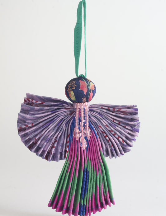 Angel Christmas Ornament made from upcycled saris, featuring pleated arms and body. A sustainable, eco-friendly holiday decoration, embodying recycled fashion and upcycling in festive style.





