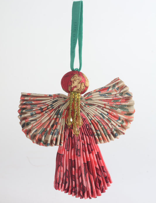 Angel Christmas Ornament made from upcycled saris, featuring pleated arms and body. A sustainable, eco-friendly holiday decoration, embodying recycled fashion and upcycling in festive style.





