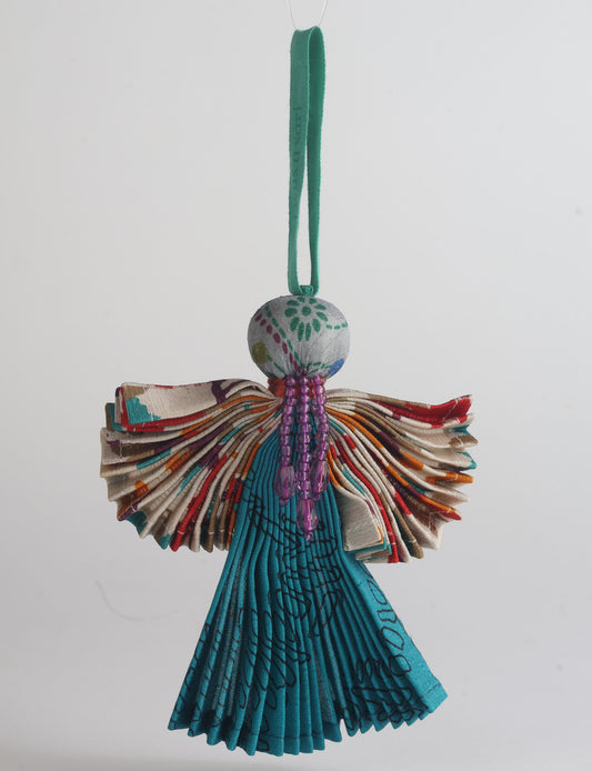 Angel Christmas Ornament made from upcycled saris, featuring pleated arms and body. A sustainable, eco-friendly holiday decoration, embodying recycled fashion and upcycling in festive style.





