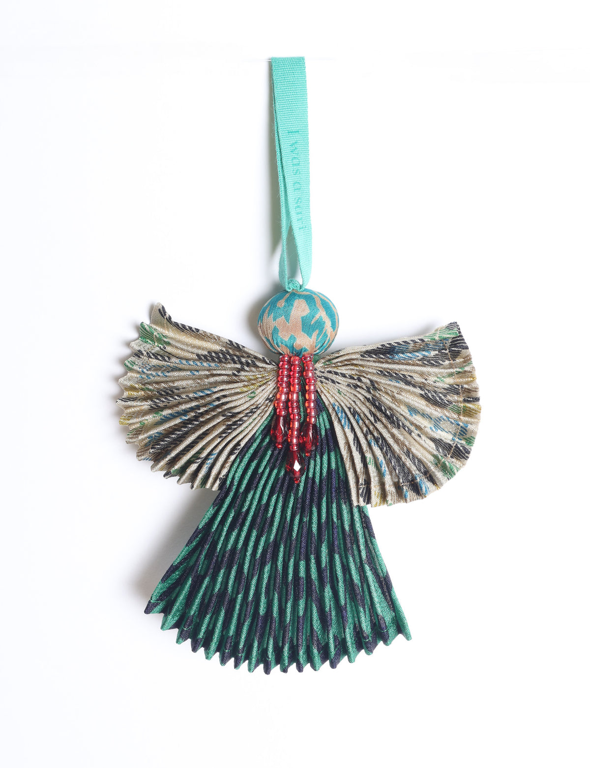 Angel Christmas Ornament made from upcycled saris, featuring pleated arms and body. A sustainable, eco-friendly holiday decoration, embodying recycled fashion and upcycling in festive style.





