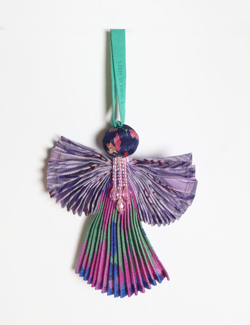 Angel Christmas Ornament made from upcycled saris, featuring pleated arms and body. A sustainable, eco-friendly holiday decoration, embodying recycled fashion and upcycling in festive style.





