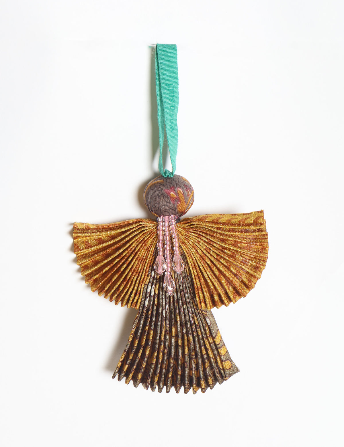 Angel Christmas Ornament made from upcycled saris, featuring pleated arms and body. A sustainable, eco-friendly holiday decoration, embodying recycled fashion and upcycling in festive style.





