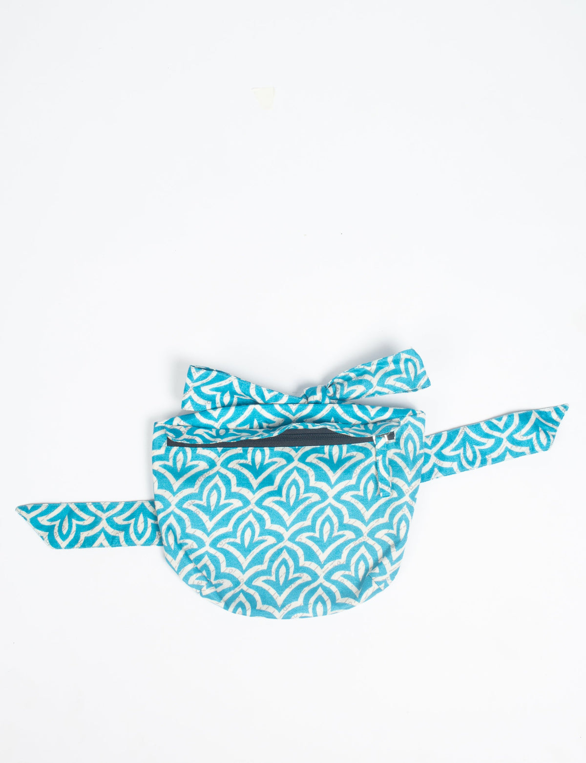 Blue and white abstract patterned midi belt bag with front zipper pocket, flat lay on white background