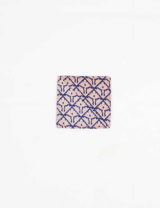 Colorful square-shaped corner bookmark made from recycled sari textiles, representing repurposed clothing, fair trade fashion, and ethical fashion. An earth-friendly product made from textile waste, aligning with carbon neutral clothing values.