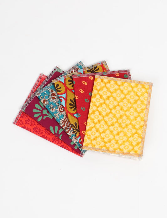 Folded Celebration Card Set, 6 pieces made from recycled sari fabric, showcasing sustainable, eco-friendly, and upcycled fashion principles. Ideal for sending wishes while supporting circular fashion, sustainable apparel, and environmentally friendly practices.