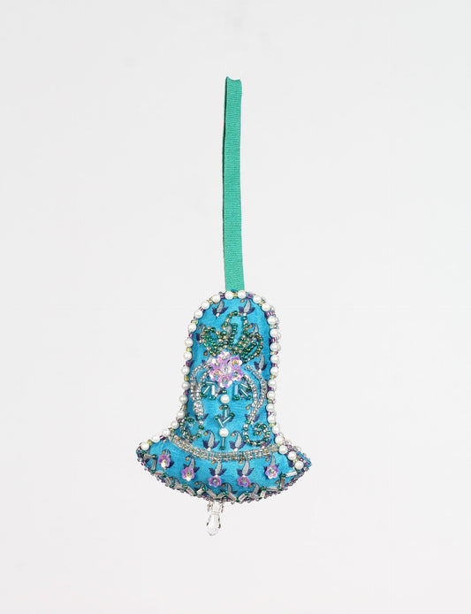 Bell-shaped Christmas ornament made from recycled saris, showcasing Aari embroidery, sustainable apparel, and green fashion. A celebration of upcycled clothing and eco-friendly products with a focus on sustainable women’s clothing and recycled fashion.