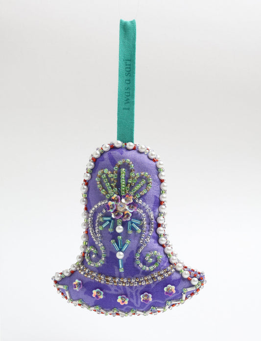 Bell-shaped Christmas ornament made from recycled saris, showcasing Aari embroidery, sustainable apparel, and green fashion. A celebration of upcycled clothing and eco-friendly products with a focus on sustainable women’s clothing and recycled fashion.