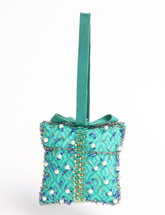 Eco-conscious Christmas ornament crafted from preloved saris, showcasing intricate Aari hand embroidery by female artisans. A beautiful, fair trade, upcycled decoration reflecting sustainable fashion, recycled materials, and ethical craftsmanship in green, earth-friendly, and circular fashion.