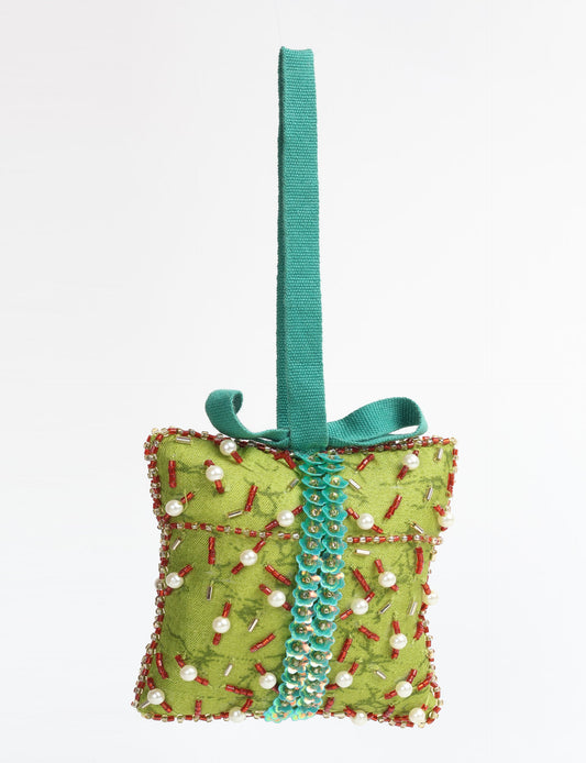 Eco-conscious Christmas ornament crafted from preloved saris, showcasing intricate Aari hand embroidery by female artisans. A beautiful, fair trade, upcycled decoration reflecting sustainable fashion, recycled materials, and ethical craftsmanship in green, earth-friendly, and circular fashion.