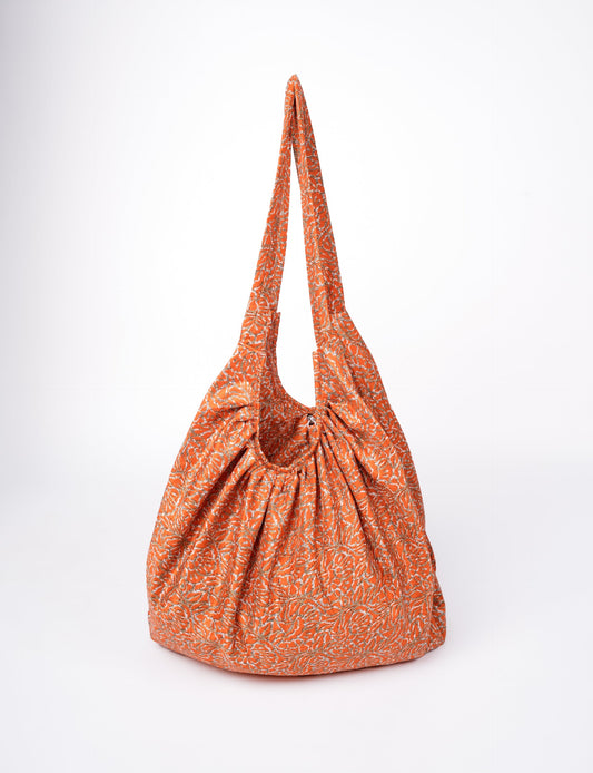A stylish HOBO BAG made from recycled materials, perfect for eco-conscious fashionistas.