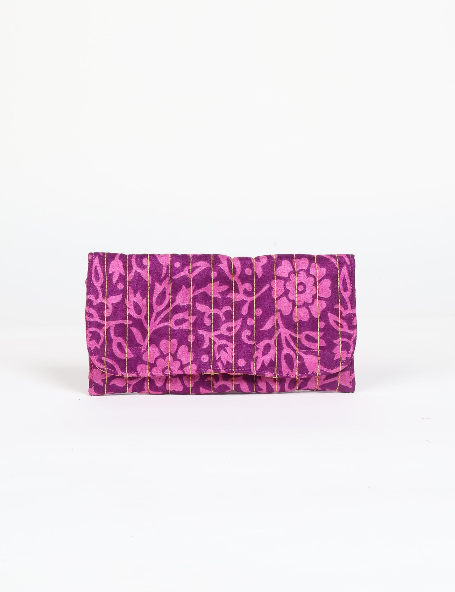 Quilted sunglasses case made from recycled sari products, featuring a secure magnetic closure. A chic example of ethical fashion, conscious clothing, and carbon neutral fashion. Protect your sunglasses while embracing circular fashion and upcycled garments.