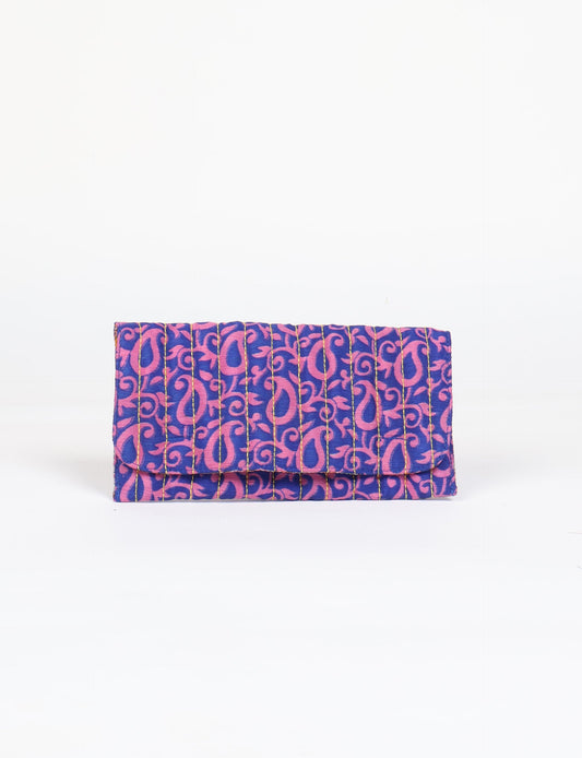 Quilted sunglasses case made from recycled sari products, featuring a secure magnetic closure. A chic example of ethical fashion, conscious clothing, and carbon neutral fashion. Protect your sunglasses while embracing circular fashion and upcycled garments.