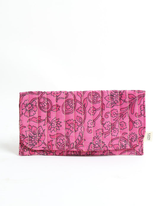 Quilted sunglasses case made from recycled sari products, featuring a secure magnetic closure. A chic example of ethical fashion, conscious clothing, and carbon neutral fashion. Protect your sunglasses while embracing circular fashion and upcycled garments.