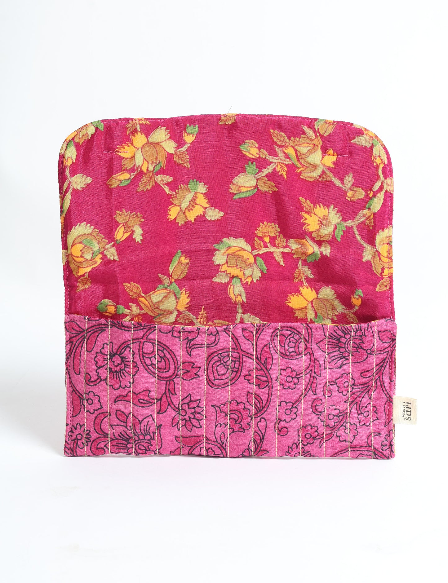Quilted sunglasses case made from recycled sari products, featuring a secure magnetic closure. A chic example of ethical fashion, conscious clothing, and carbon neutral fashion. Protect your sunglasses while embracing circular fashion and upcycled garments.