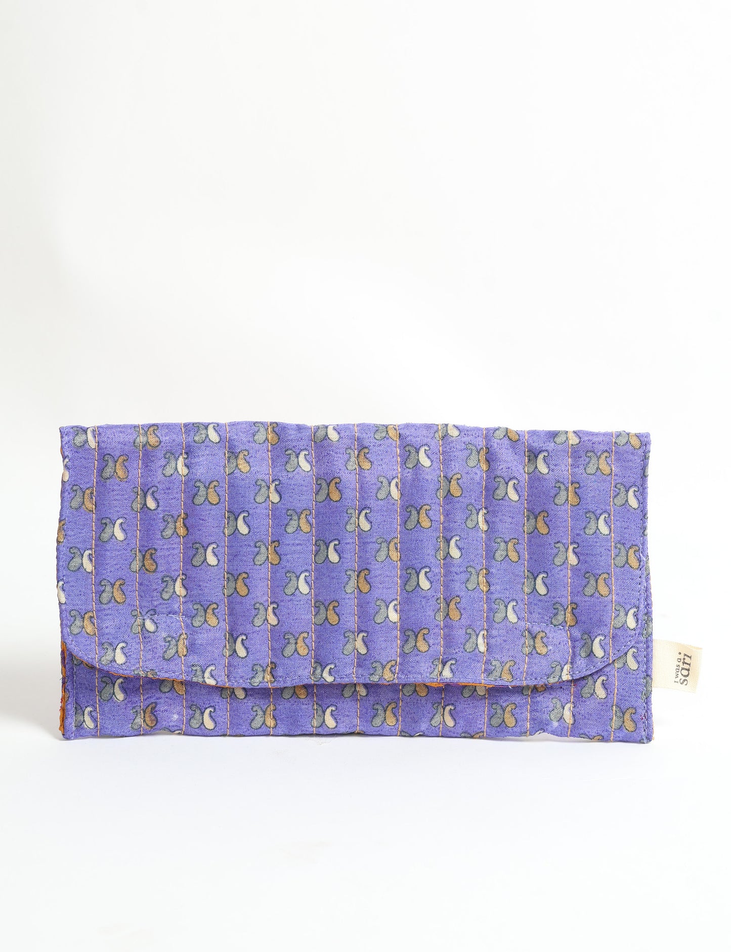 Quilted sunglasses case made from recycled sari products, featuring a secure magnetic closure. A chic example of ethical fashion, conscious clothing, and carbon neutral fashion. Protect your sunglasses while embracing circular fashion and upcycled garments.