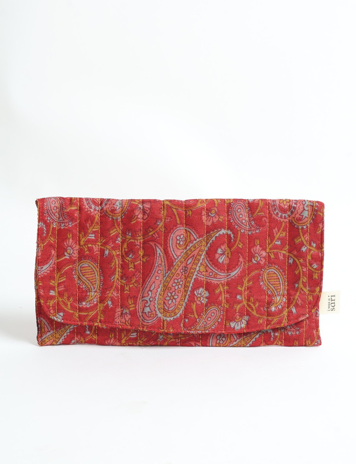 Quilted sunglasses case made from recycled sari products, featuring a secure magnetic closure. A chic example of ethical fashion, conscious clothing, and carbon neutral fashion. Protect your sunglasses while embracing circular fashion and upcycled garments.