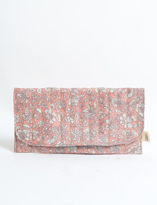 Quilted sunglasses case made from recycled sari products, featuring a secure magnetic closure. A chic example of ethical fashion, conscious clothing, and carbon neutral fashion. Protect your sunglasses while embracing circular fashion and upcycled garments.
