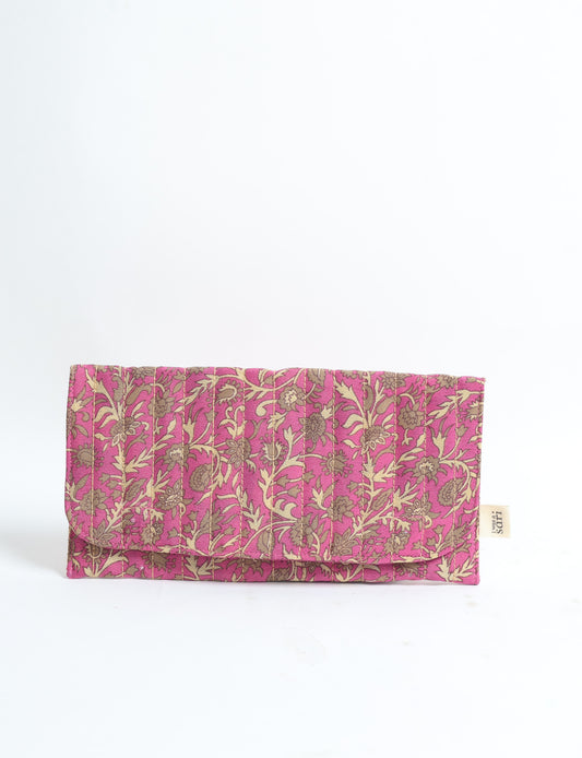 Quilted sunglasses case made from recycled sari products, featuring a secure magnetic closure. A chic example of ethical fashion, conscious clothing, and carbon neutral fashion. Protect your sunglasses while embracing circular fashion and upcycled garments.