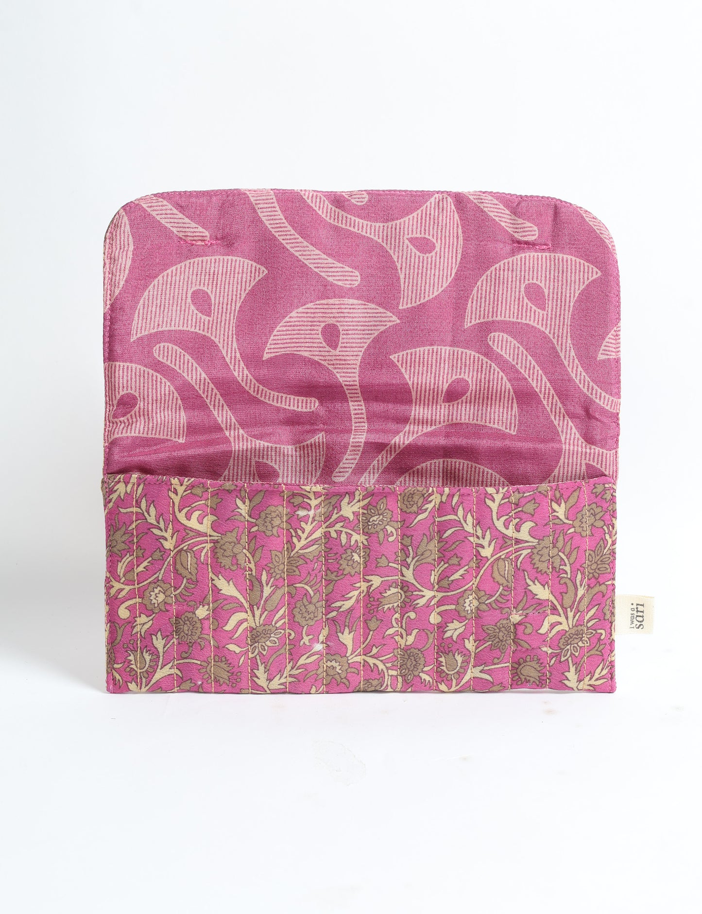 Quilted sunglasses case made from recycled sari products, featuring a secure magnetic closure. A chic example of ethical fashion, conscious clothing, and carbon neutral fashion. Protect your sunglasses while embracing circular fashion and upcycled garments.