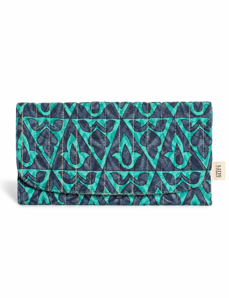 Quilted sunglasses case made from recycled sari products, featuring a secure magnetic closure. A chic example of ethical fashion, conscious clothing, and carbon neutral fashion. Protect your sunglasses while embracing circular fashion and upcycled garments.