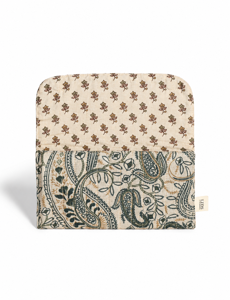 Quilted sunglasses case made from recycled sari products, featuring a secure magnetic closure. A chic example of ethical fashion, conscious clothing, and carbon neutral fashion. Protect your sunglasses while embracing circular fashion and upcycled garments.