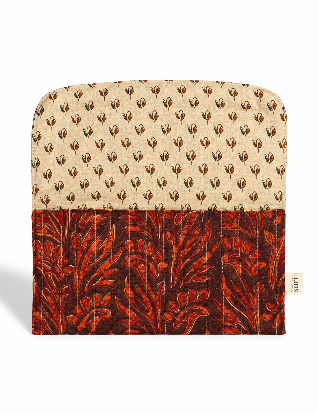 Quilted sunglasses case made from recycled sari products, featuring a secure magnetic closure. A chic example of ethical fashion, conscious clothing, and carbon neutral fashion. Protect your sunglasses while embracing circular fashion and upcycled garments.