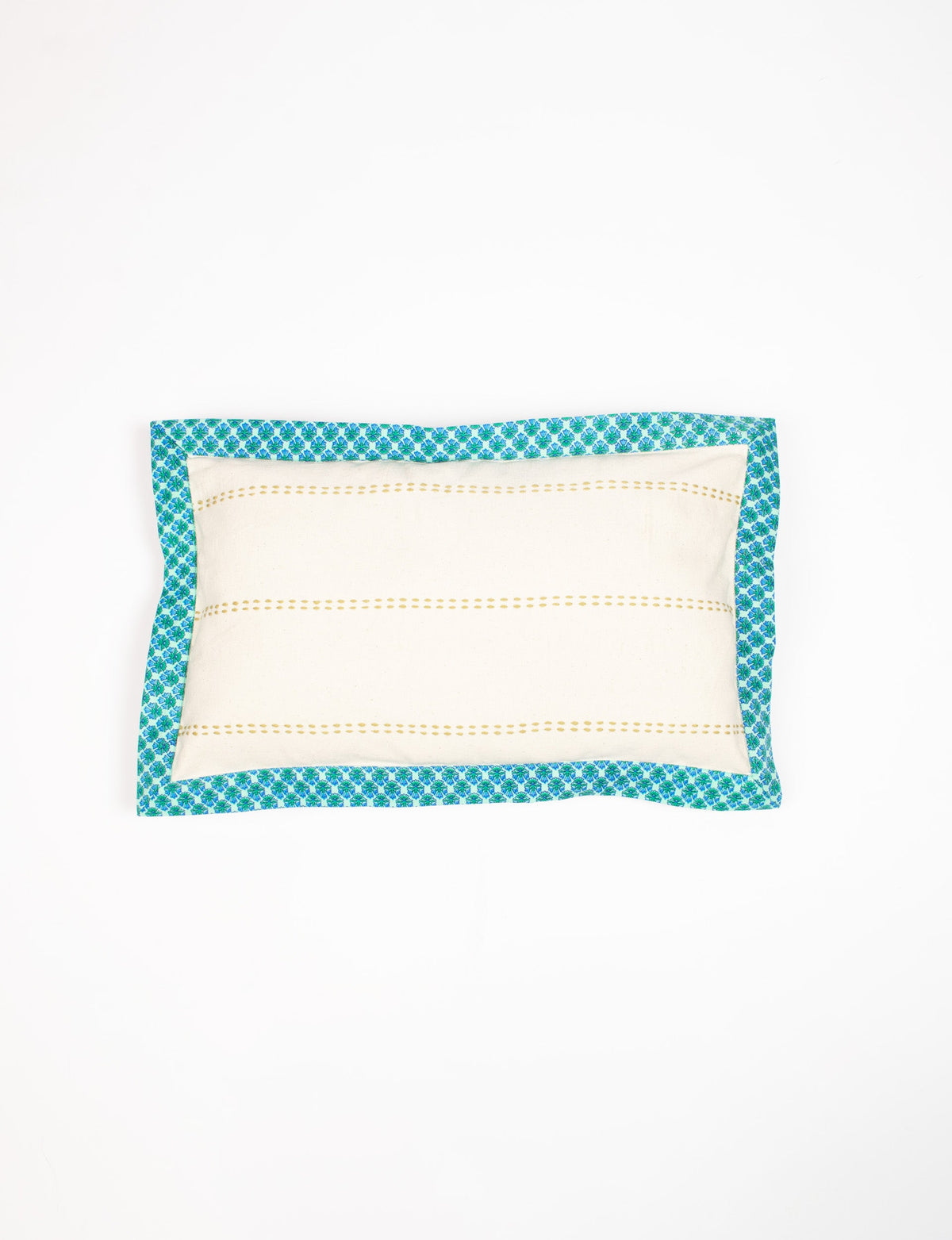 Rectangular lumbar cotton cushion cover with cream center, yellow dotted stripes, and blue floral sari edging, flat lay view
