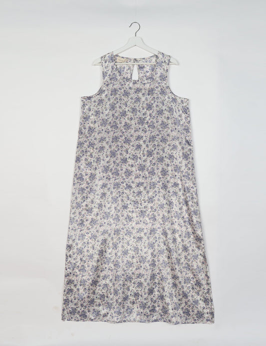 Sleeveless A-Line maxi dress made from recycled saris, showcasing eco clothing and green fashion. A chic example of upcycled women's clothing and climate neutral clothing, perfect for fans of circular fashion, carbon neutral fashion, and products made from textile waste.