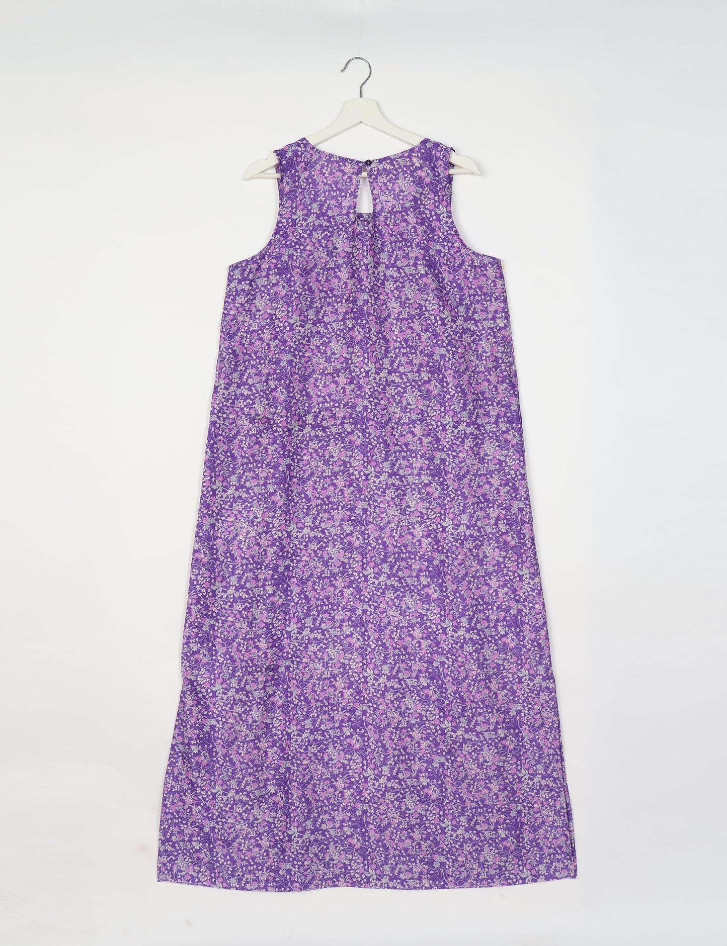 Sleeveless A-Line maxi dress made from recycled saris, showcasing eco clothing and green fashion. A chic example of upcycled women's clothing and climate neutral clothing, perfect for fans of circular fashion, carbon neutral fashion, and products made from textile waste.