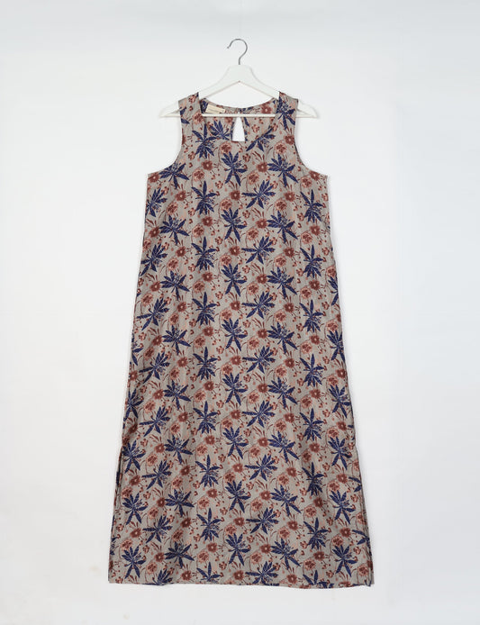 Sleeveless A-Line maxi dress made from recycled saris, showcasing eco clothing and green fashion. A chic example of upcycled women's clothing and climate neutral clothing, perfect for fans of circular fashion, carbon neutral fashion, and products made from textile waste.