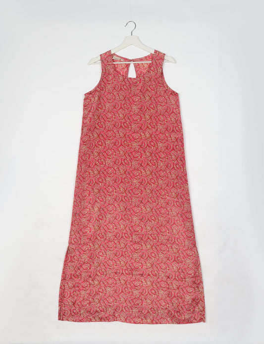 Sleeveless A-Line maxi dress made from recycled saris, showcasing eco clothing and green fashion. A chic example of upcycled women's clothing and climate neutral clothing, perfect for fans of circular fashion, carbon neutral fashion, and products made from textile waste.